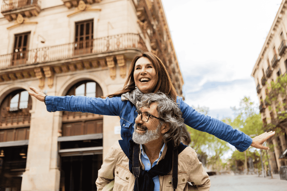Middle-aged couple exploring city